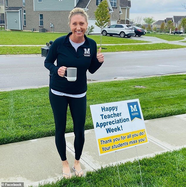 Emily Nutley previously taught at Madeira Elementary School, also in Cincinnati, and posted photos of her work and students there on social media (Daily Mail) EMILY Nutley is pictured outside with a sign for teacher appreciation week. She is smiling with a thumbs up.