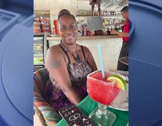 In a heartbreaking case of mistaken identity, Nicole Winds-Clemons, a devoted wife, mother, and grandmother, sacrificed her life to protect her loved ones. Her compassion and strength will never be forgotten. Image is Nicole Clemons smiling and a drink in front of her.